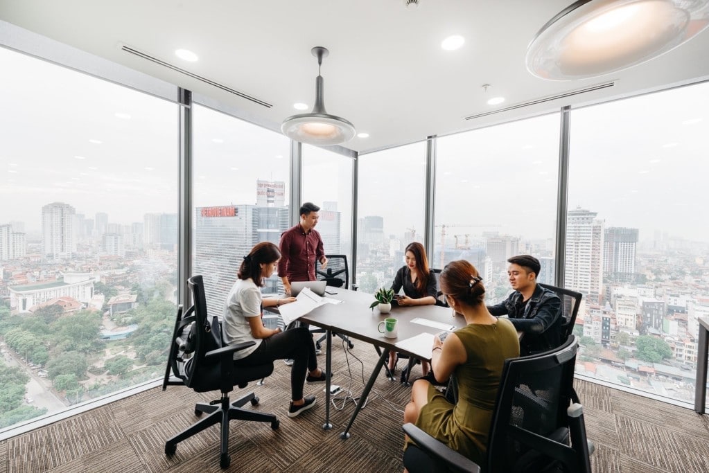 Group of people discussing business