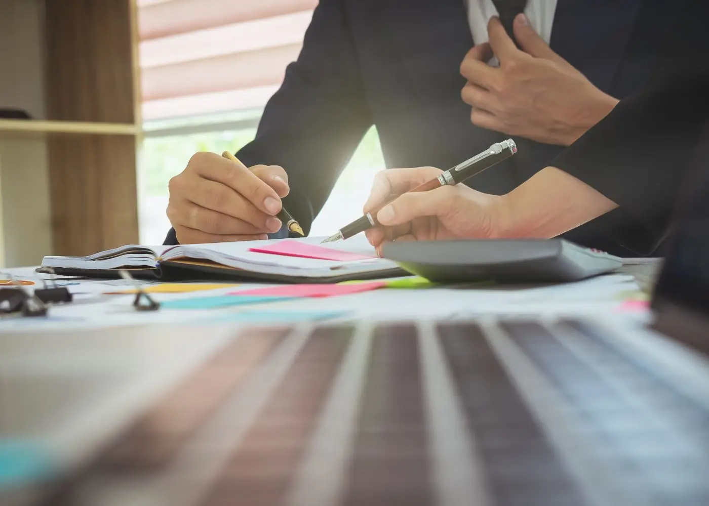 Business owner completing due diligence checklist before selling