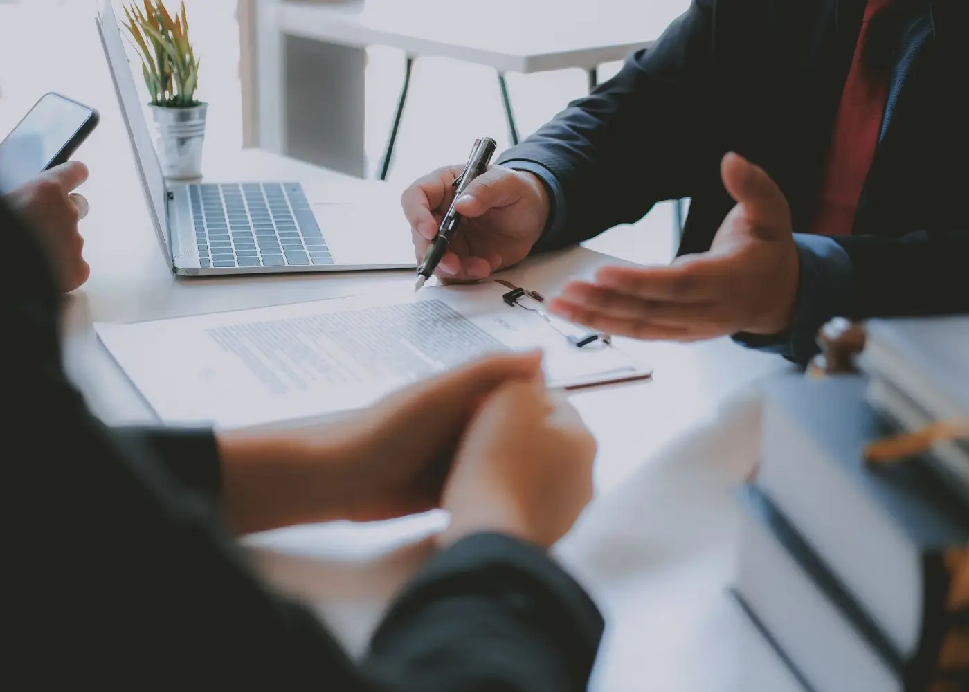 Business owner reviewing risks of first inbound offer when selling a company